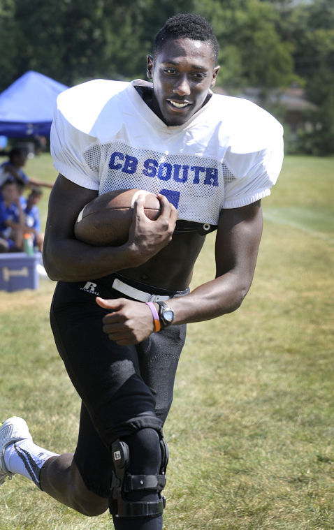 Josh Adams tackles a football like he tackles school! Photo from Art Gentile via The Intelligencer