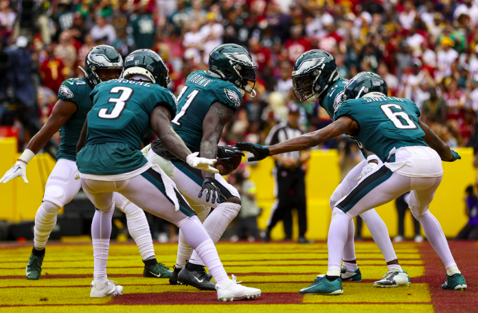 Eagles+wide+receivers+celebrate+a+touchdown+in+Washingtons+end+zone.