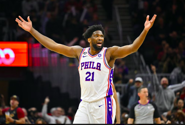 CLEVELAND, OHIO - MARCH 15: Joel Embiid #21 of the Philadelphia 76ers reacts after being called for a foul during the fourth quarter of the game against the Cleveland Cavaliers at Rocket Mortgage Fieldhouse on March 15, 2023 in Cleveland, Ohio.